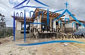 vista de un costado, casa en construcción y en venta, vereda Monquirá , sector pozos azules, Villa de Leyva